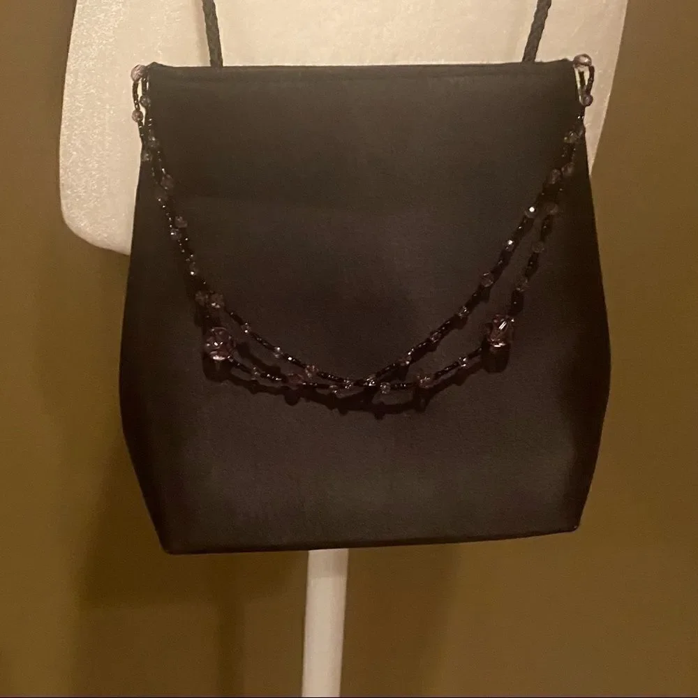 Black Elegant Bag With A Little Beading Hanging In Front